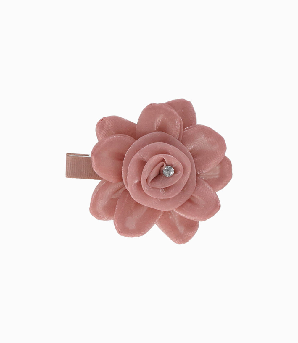 Pinche niña con flor