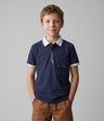 Polera niño piqué con bolsillo