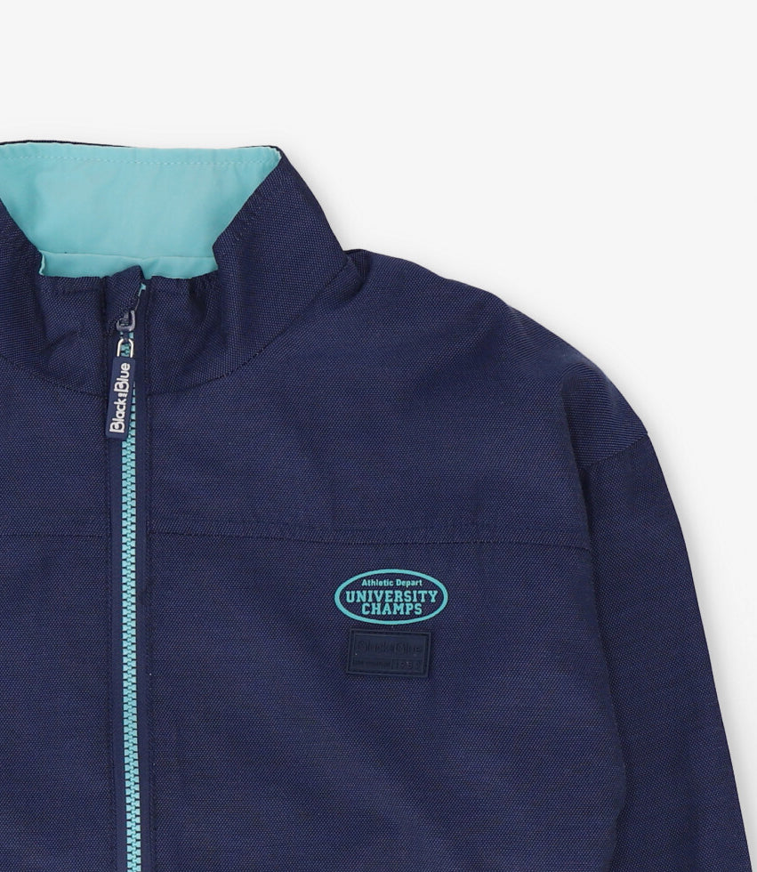 Chaqueta niño cortaviento reversible