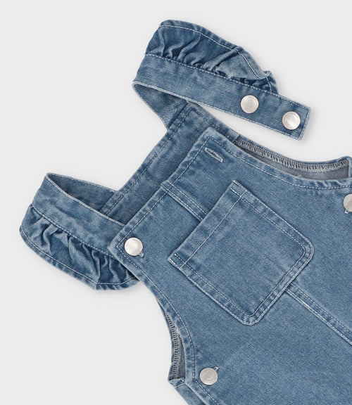 Jardinera bebé niña con flores