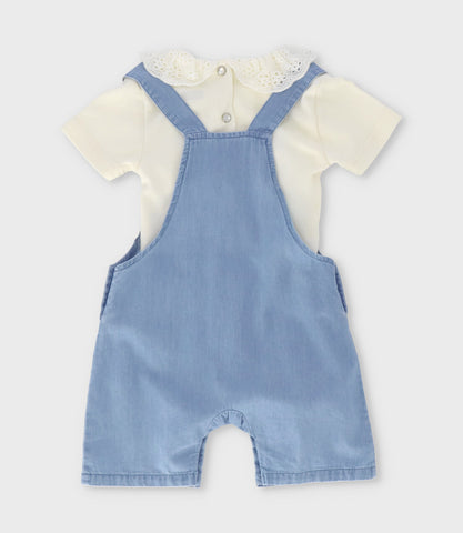 Jardinera recién nacida con gatito