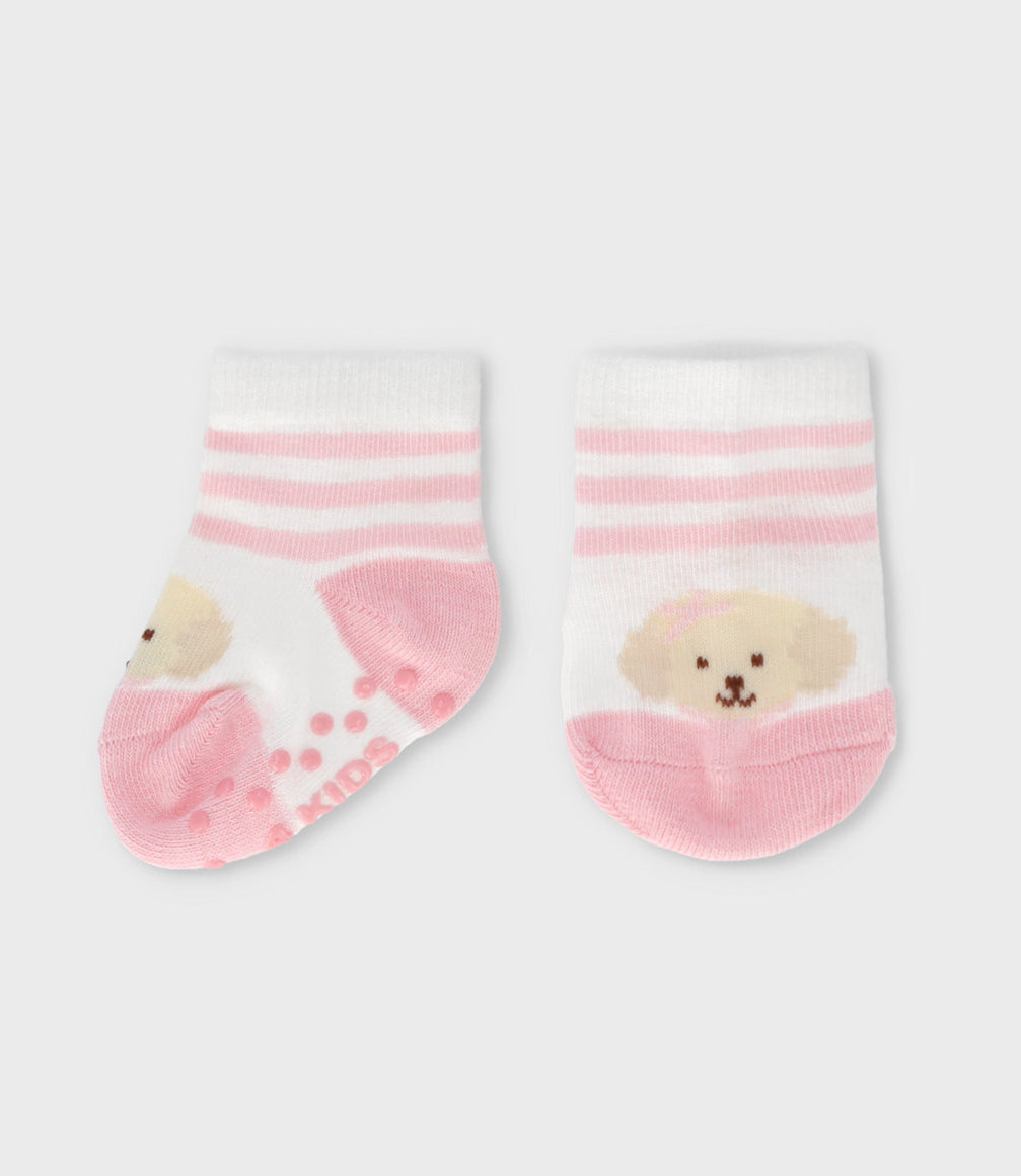 Calcetín recién nacida con perrito