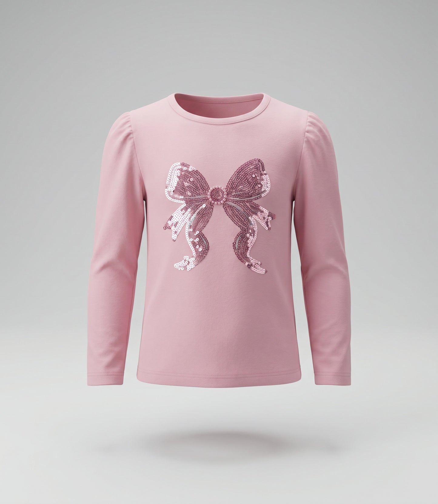 Polera niña con lazo de lentejuelas