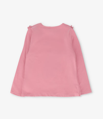 Polera niña con estampado y vuelo