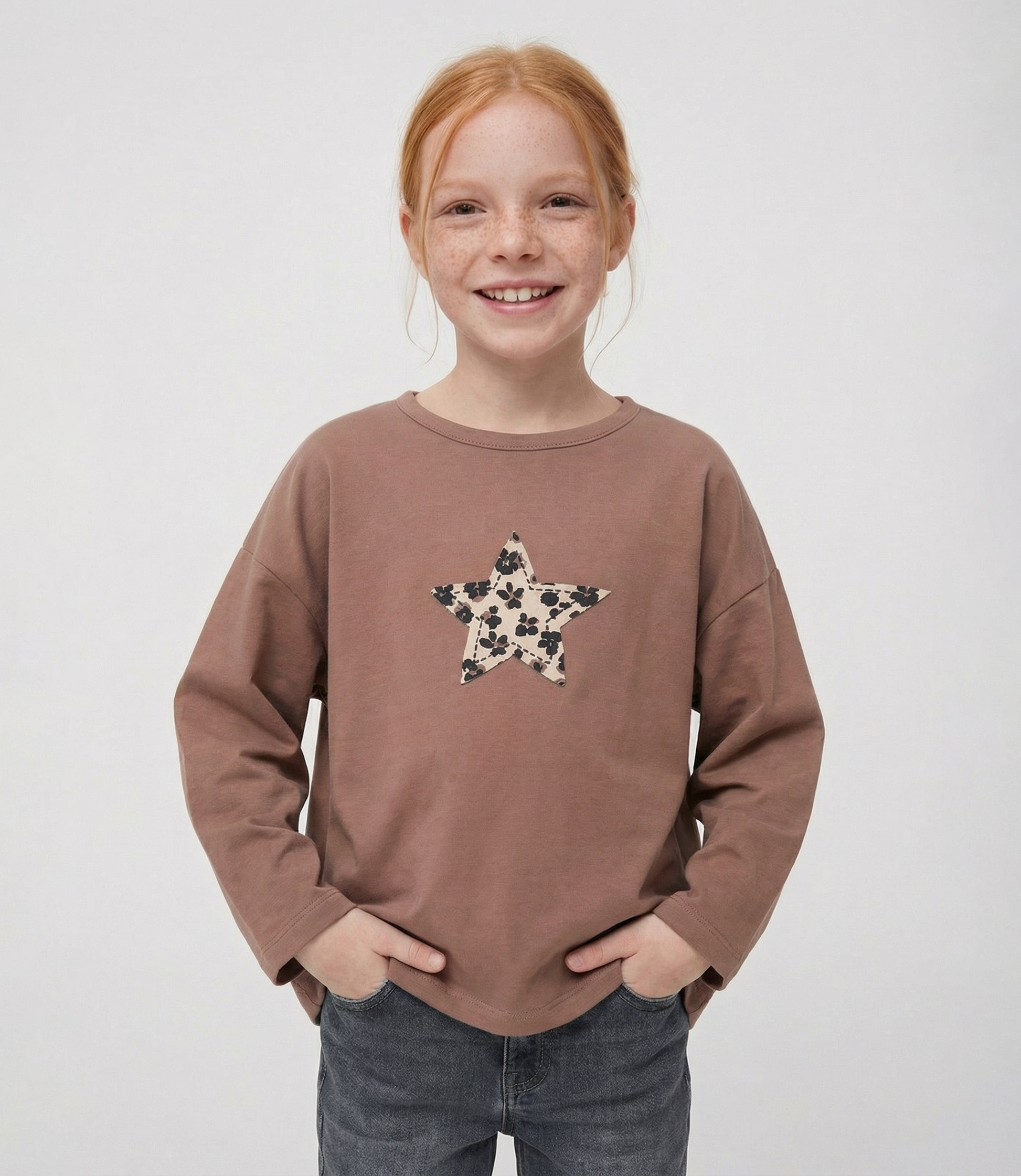 Polera niña con estrella animal print 2 años / Café