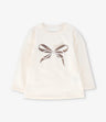 Polera niña con lazo