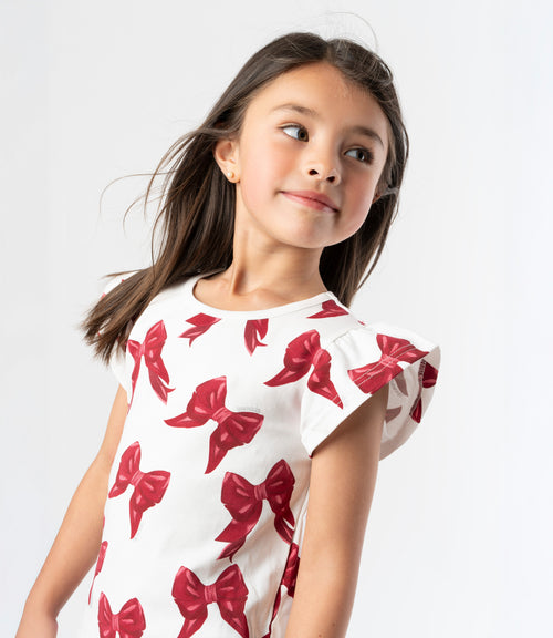 Polera niña con lazos y vuelos