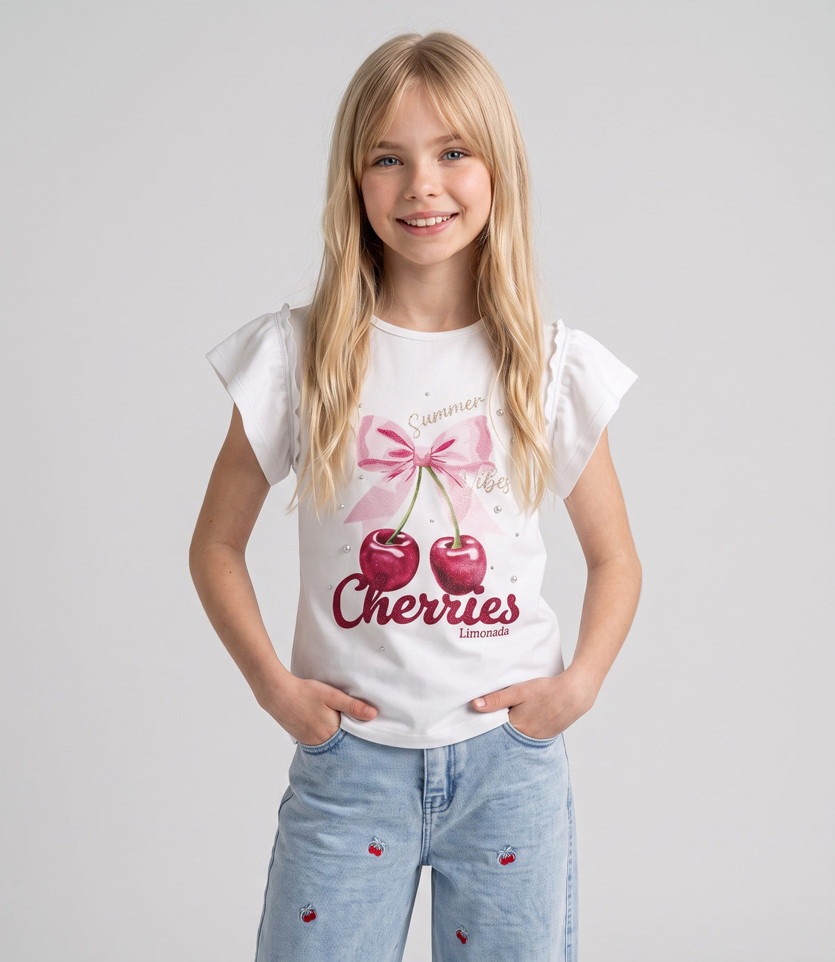 Polera niña con vuelos y cherry