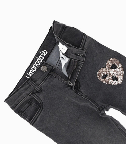 Jeans niña con flecos