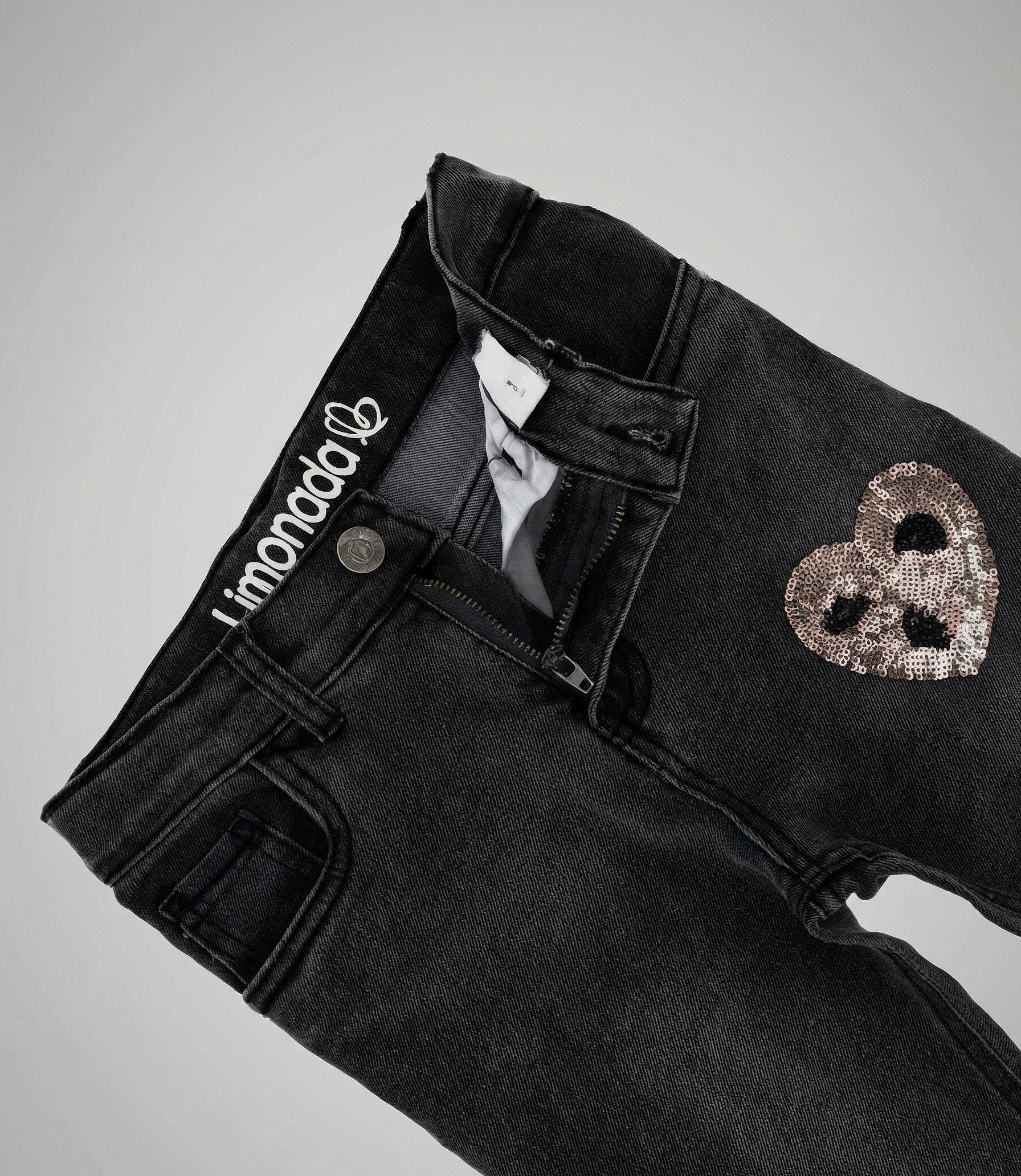 Jeans niña con flecos 2 años / Gris