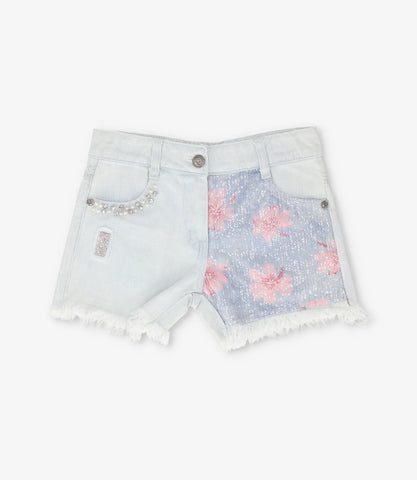Short niña con lentejuelas y flores