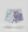 Short niña con lentejuelas y flores