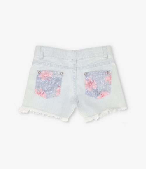 Short niña con lentejuelas y flores