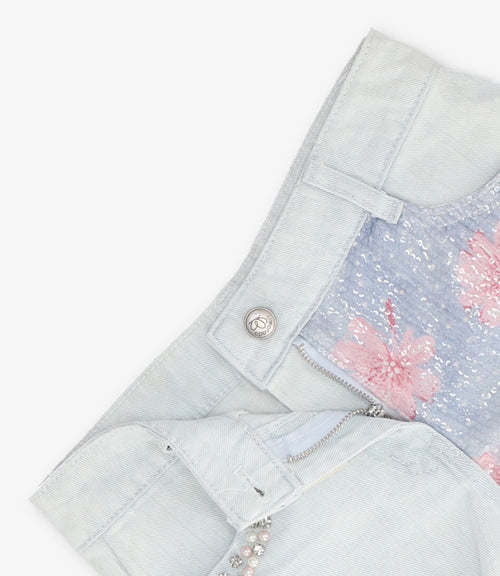 Short niña con lentejuelas y flores