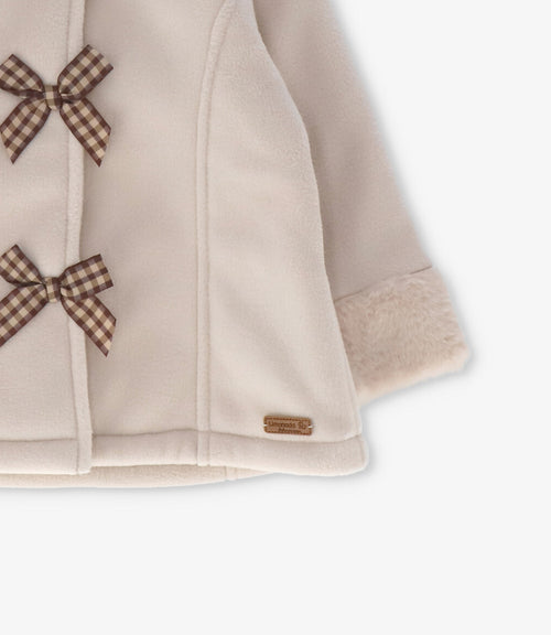 Abrigo bebé con lazos