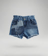 Short bebé patchwork con flor