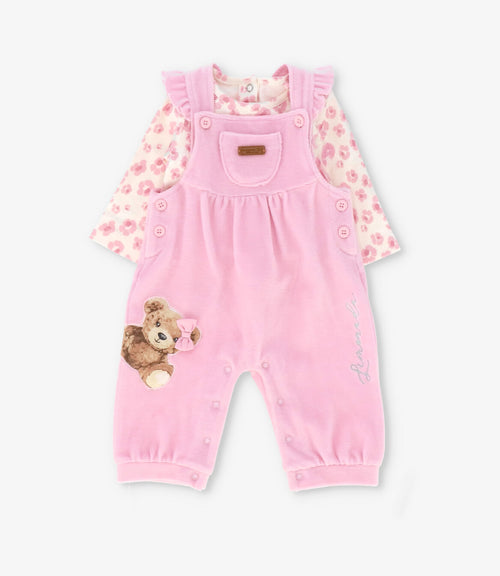 Jardinera recién nacida con vuelos y oso