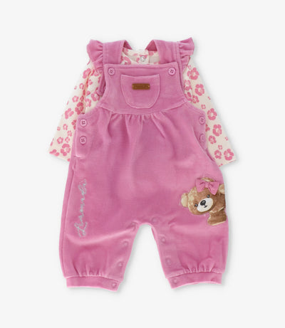 Jardinera recién nacida con vuelos y oso