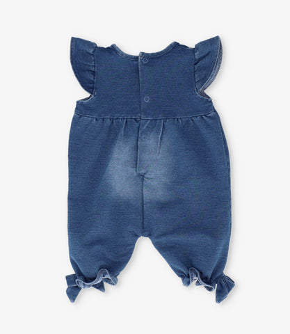 Enterito recién nacida con flores y vuelos