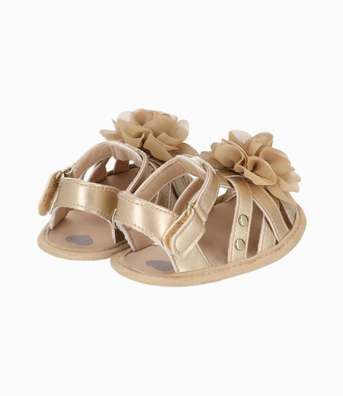 Sandalia recién nacida con flor