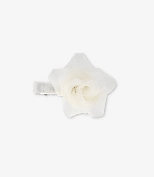 Pinche niña con flor