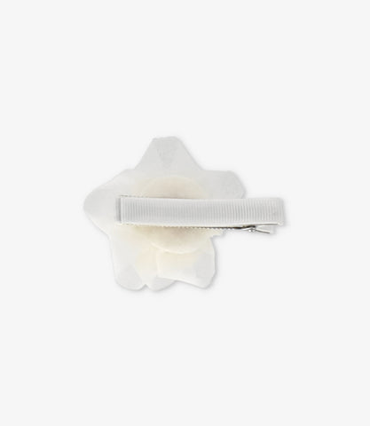 Pinche niña con flor