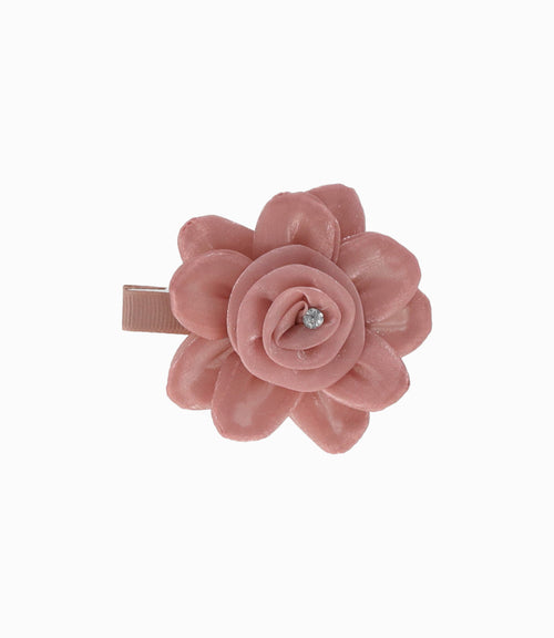 Pinche niña con flor