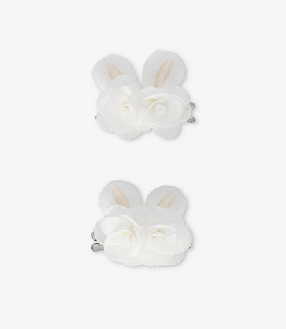 Pinche niña con rosas