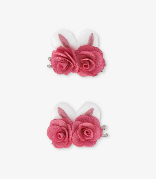 Pinche niña con rosas