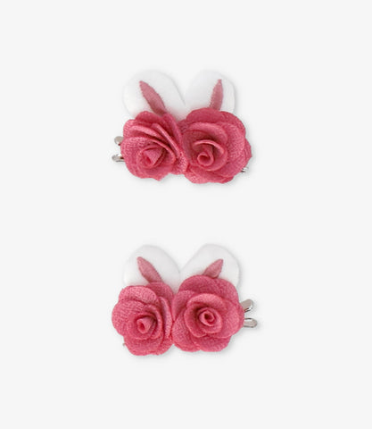 Pinche niña con rosas