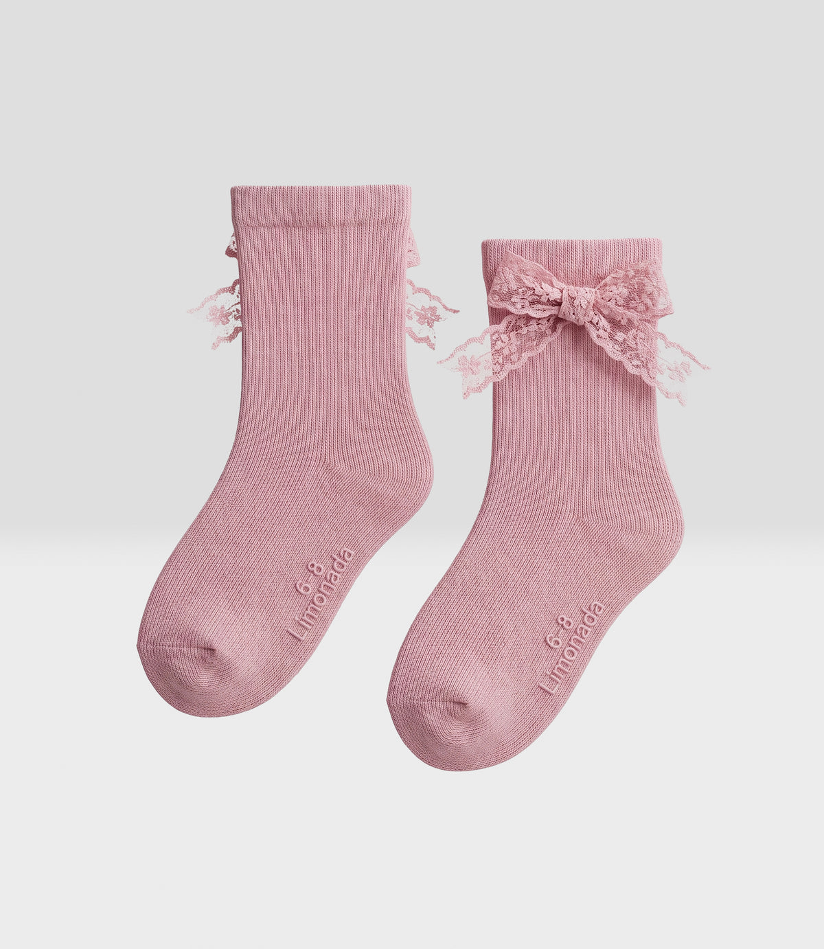 Calcetín niña con lazo 0-1 años / Rosado