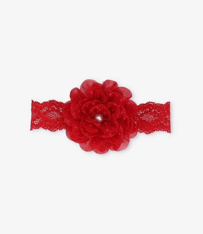 Cintillo recién nacida con flor