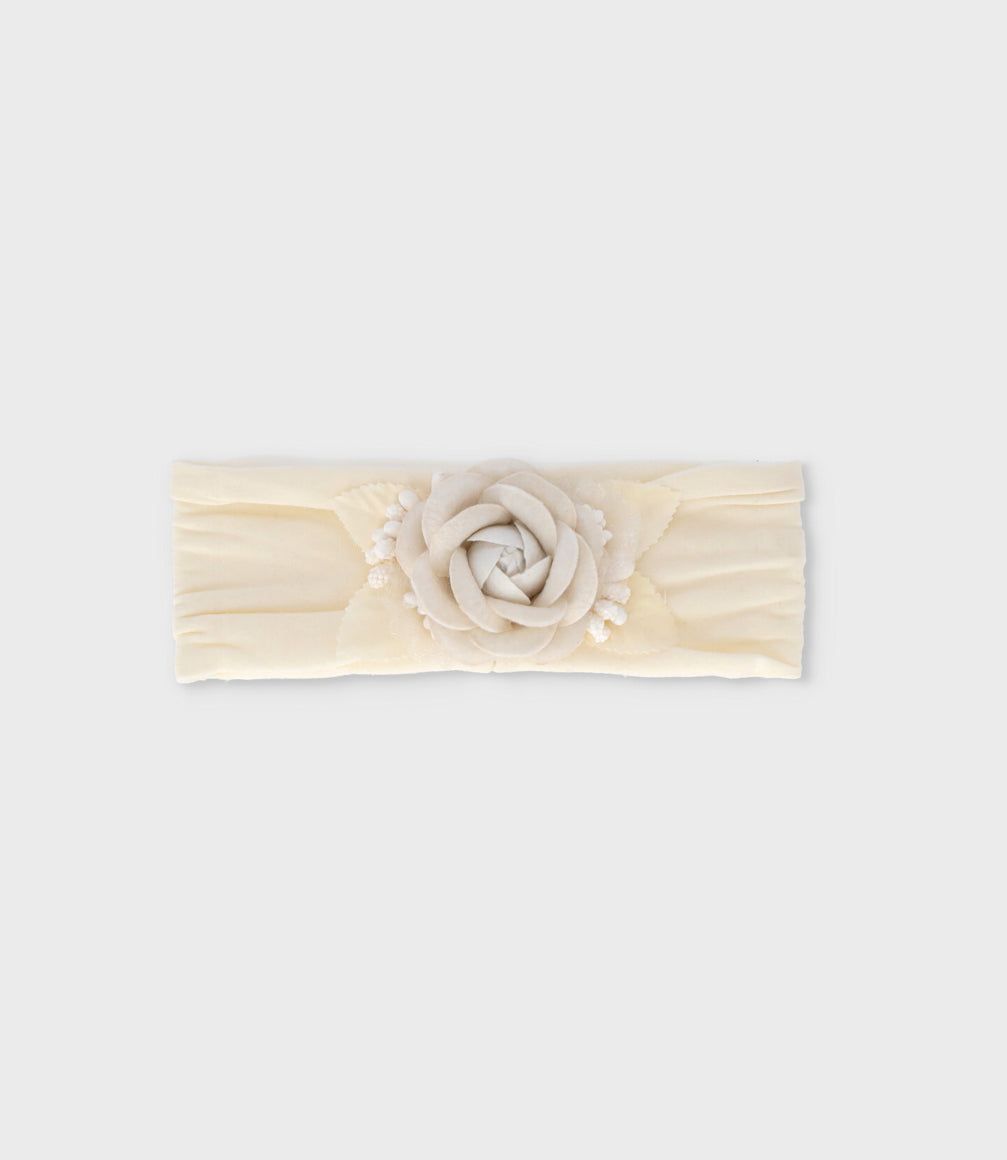 Cintillo recién nacida con flor