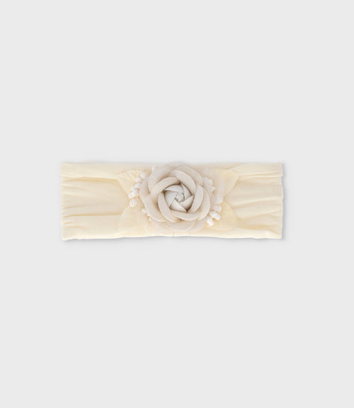Cintillo recién nacida con flor