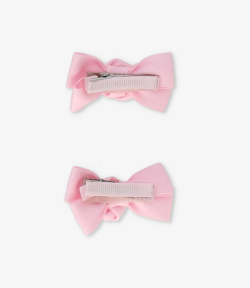 Pinche recién nacida con lazo y flor