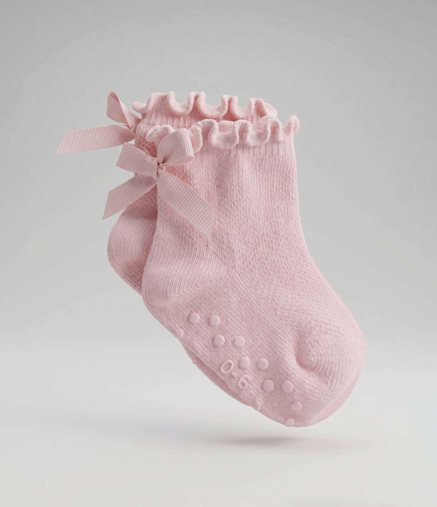 Calcetín recién nacida con lazo 0-6 meses / Rosado