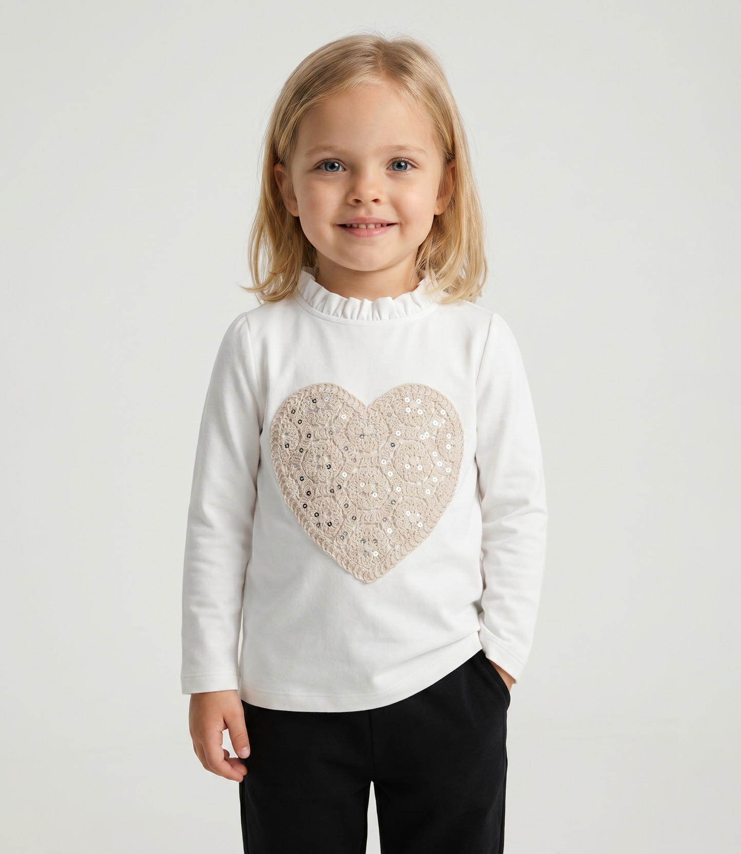 Polera bebé con corazón en macramé
