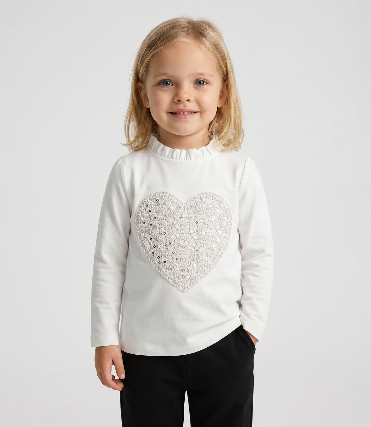 Polera bebé con corazón en macramé