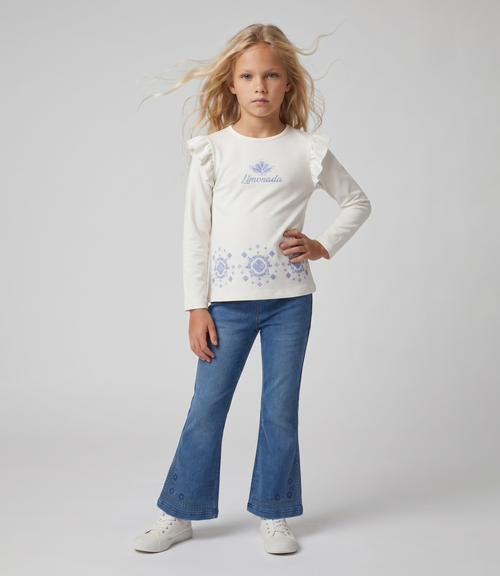 Calza niña flare de denim con bordado