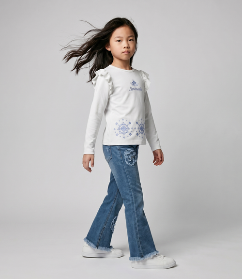 Jeans niña acampanado con flores