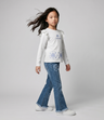Jeans niña acampanado con flores